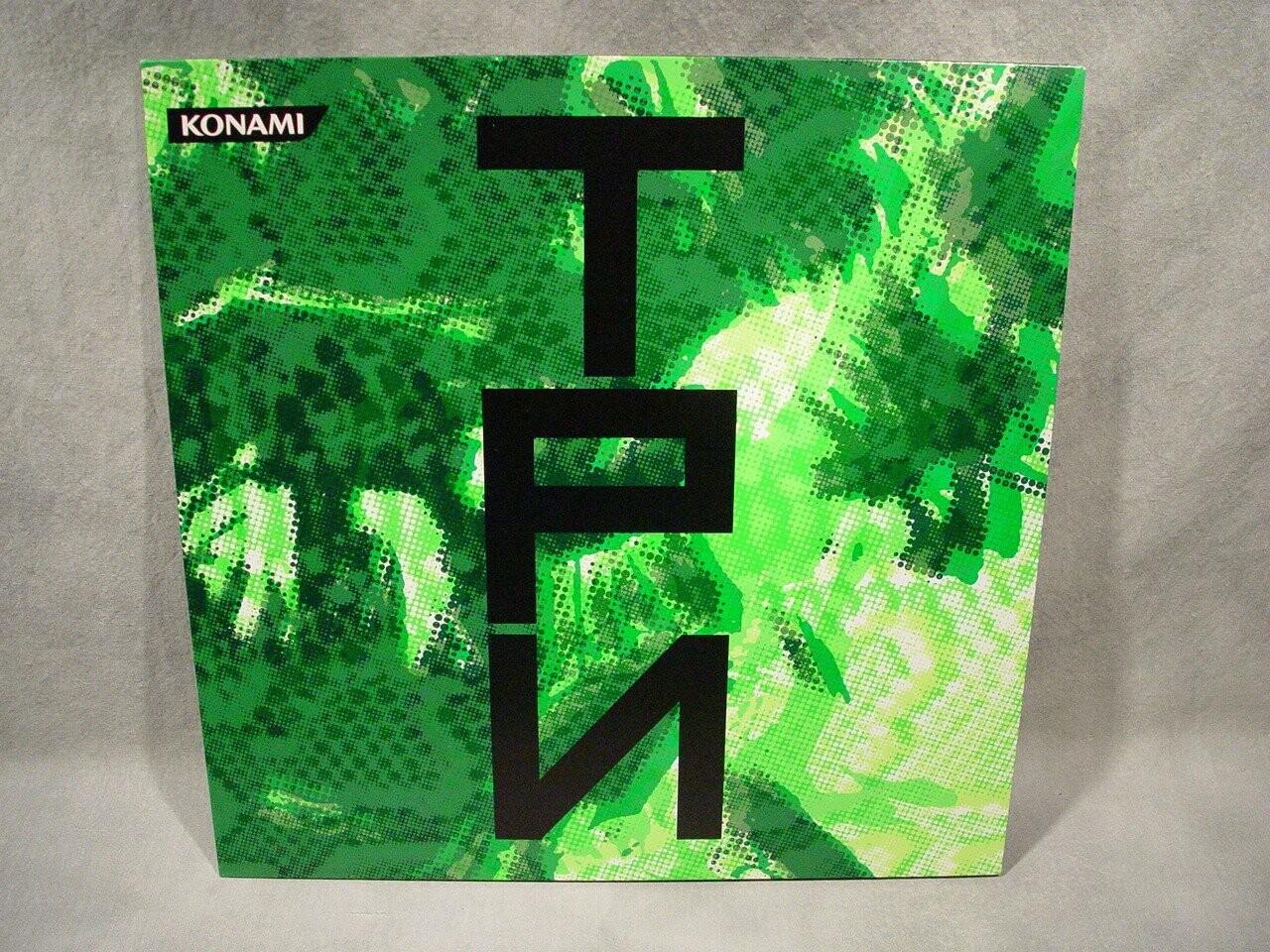 Metal Gear Solid 3 : Snake Eater (Абстрактный камуфляж). Это эксклюзивный для E3 2004 CD-сингл с виниловой копией LP. Да, на обложке действительно написано "ТРИ" на русском. Кодзима гений.